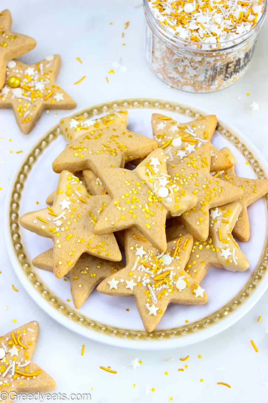 Easy sugar cookies recipe cut with star cookie cutter and flavored as Maple Cinnamon Cookies!