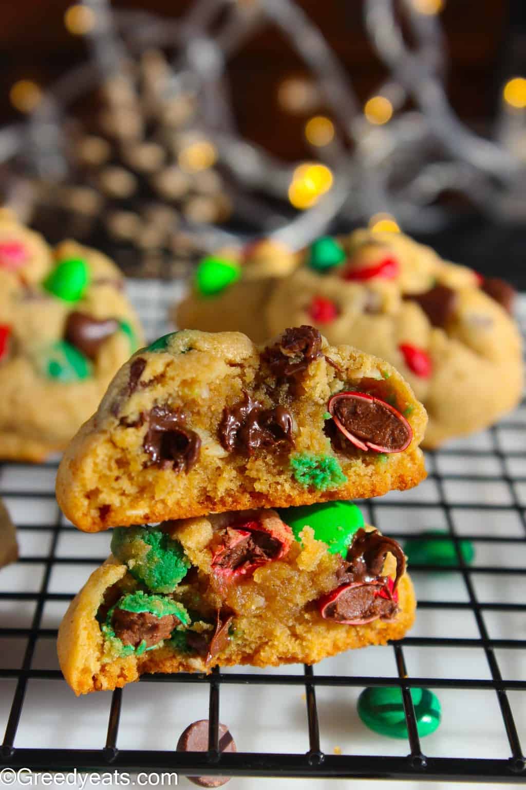 Thick and soft PB Monster Cookies with rad and green M&Ms and chocolate chips.