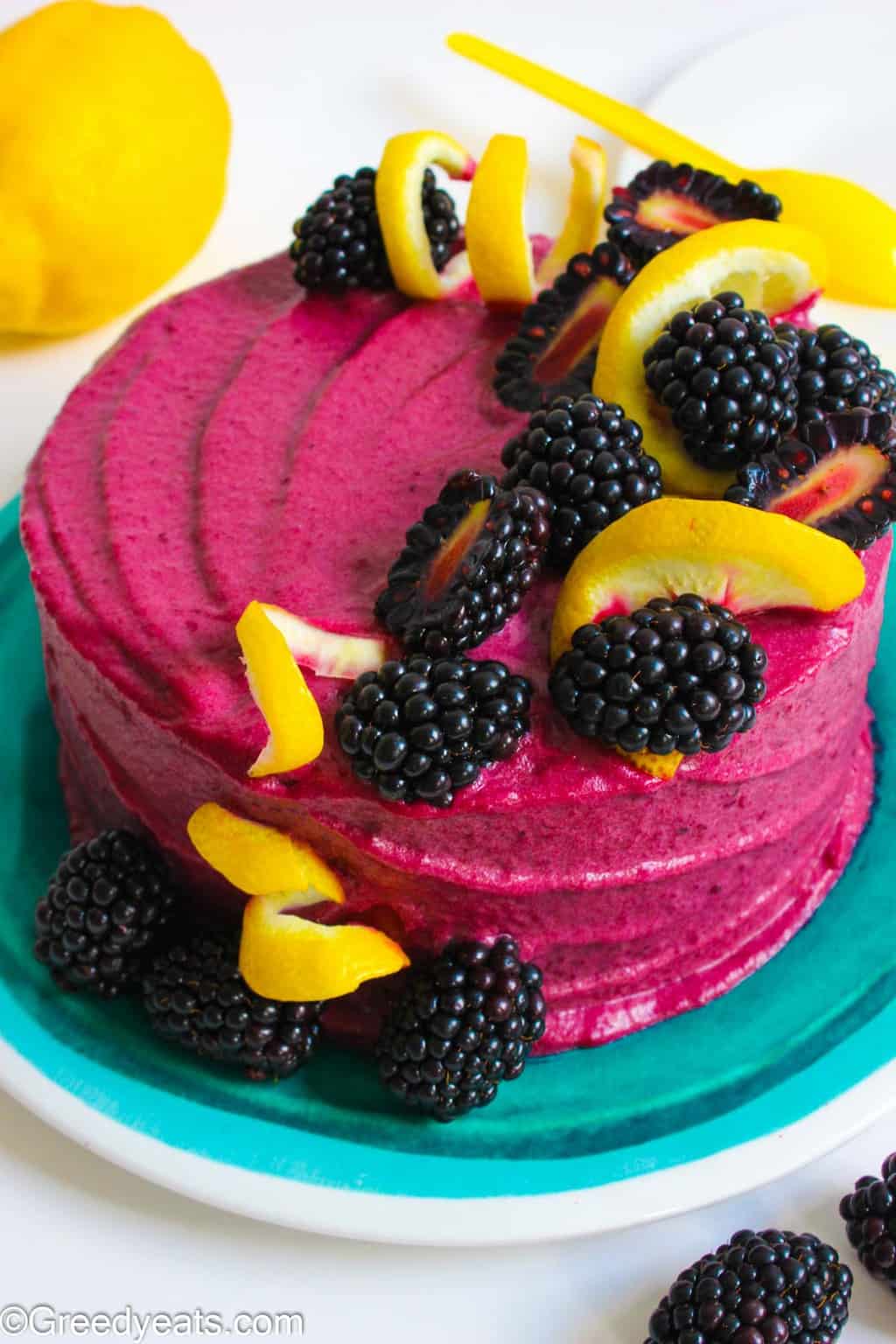 Easy and small batch Lemon Chiffon Cake recipe topped with flavorsome Blackberry Glaze.