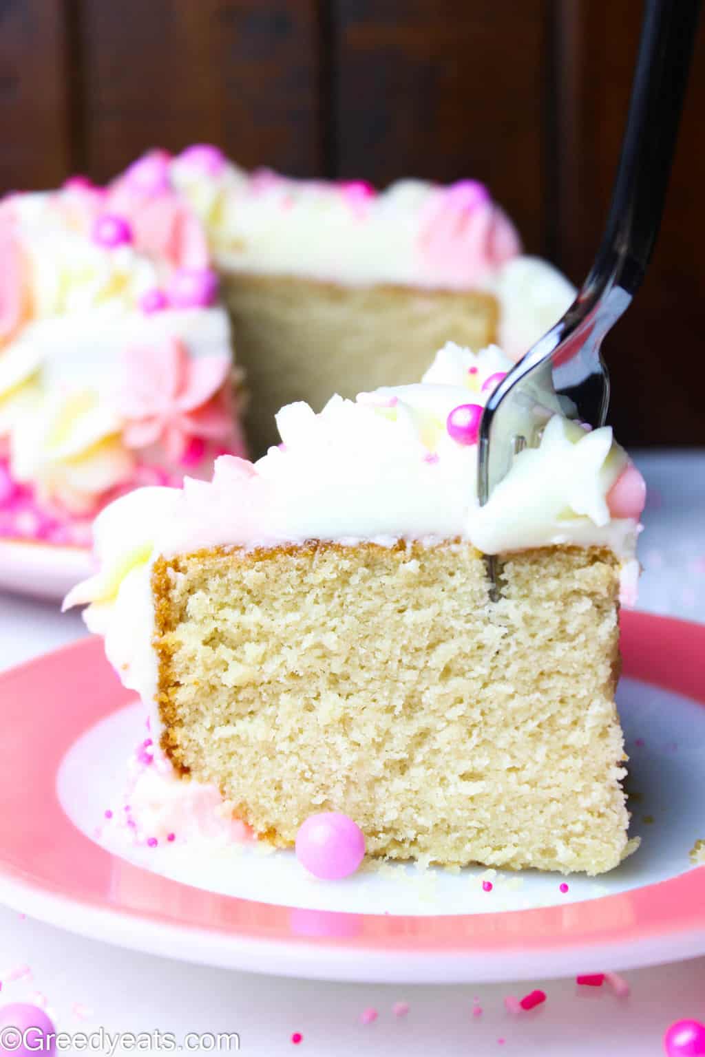 Small Vanilla Cake recipe with super soft crumb and creamy vanilla buttercream frosting.