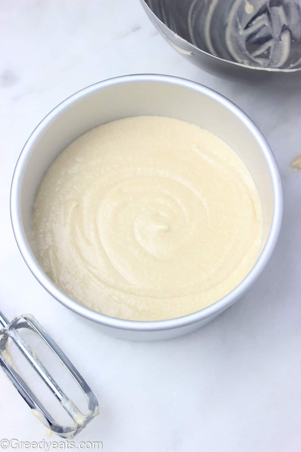 Creamy and smooth vanilla cake batter in 6 inch round cake pan.