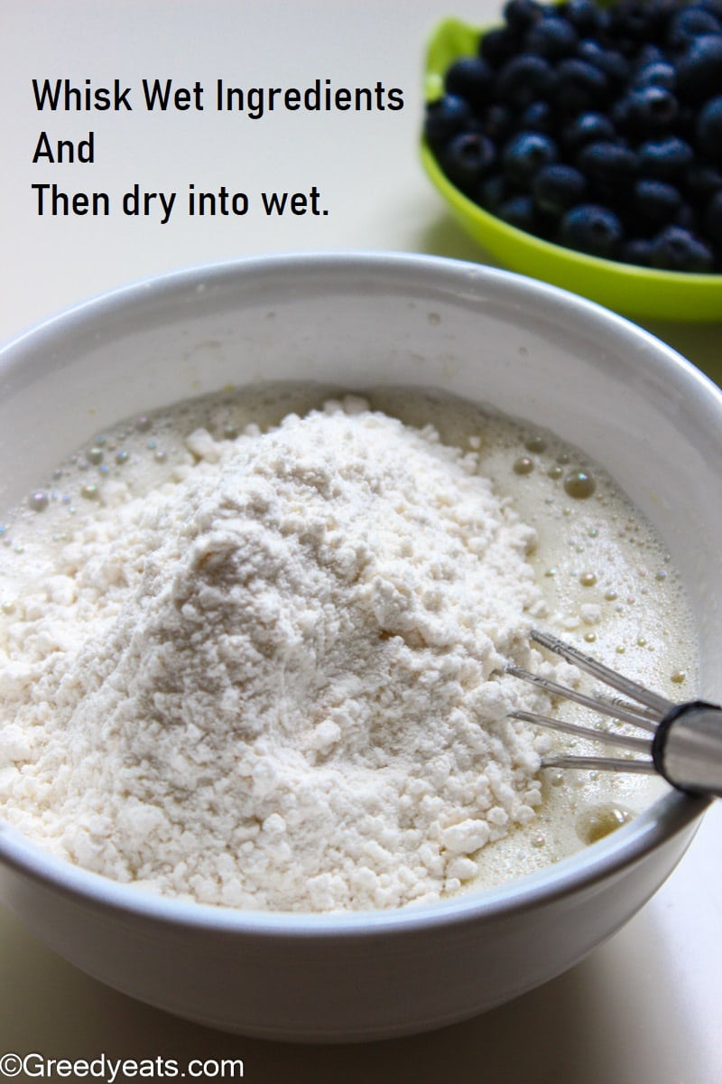 Folding dry ingredients into wet for muffin batter