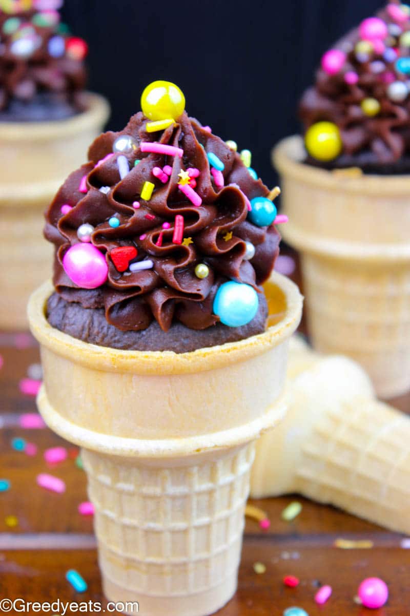 Cupcake Cones made with chocolate cake mix batter and chocolate fudge frosting.