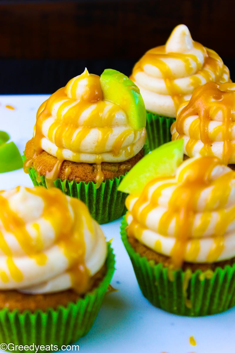 Fluffy and creamy cream cheese frosting topped on fall flavored cupcakes.