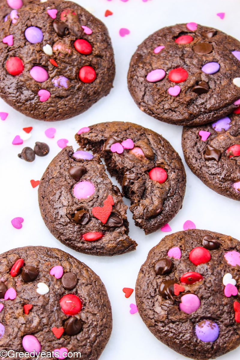Chocolate Brownie Cookies dotted with chocolate chips, valentines sprinkles and m&ms. 