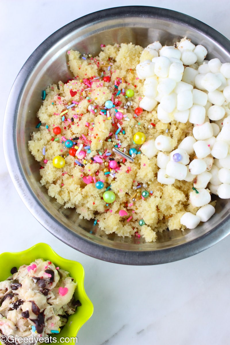 Vanilla Cake, marshmallows and sprinkles to make cake popsicles.