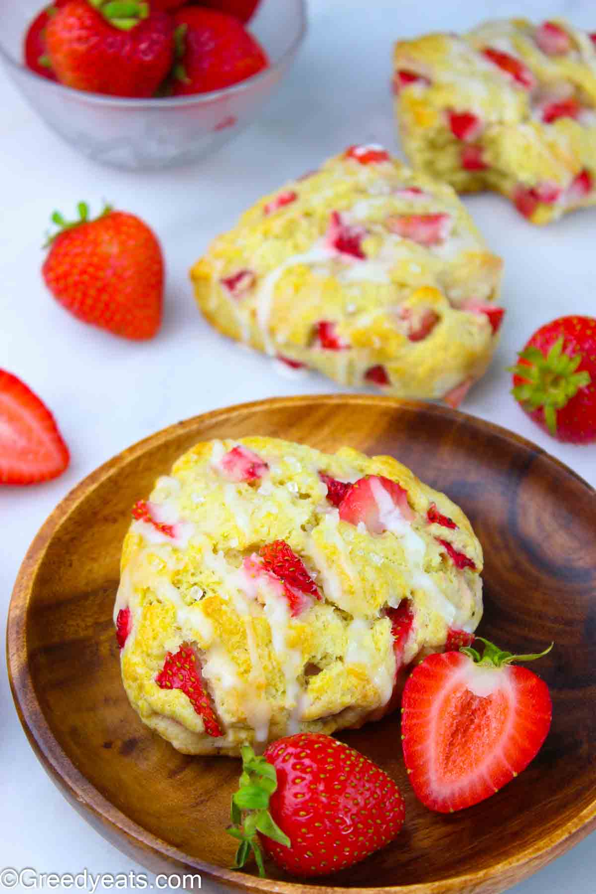 Soft and crumbly Strawberry Scones dotted with fresh strawberries.