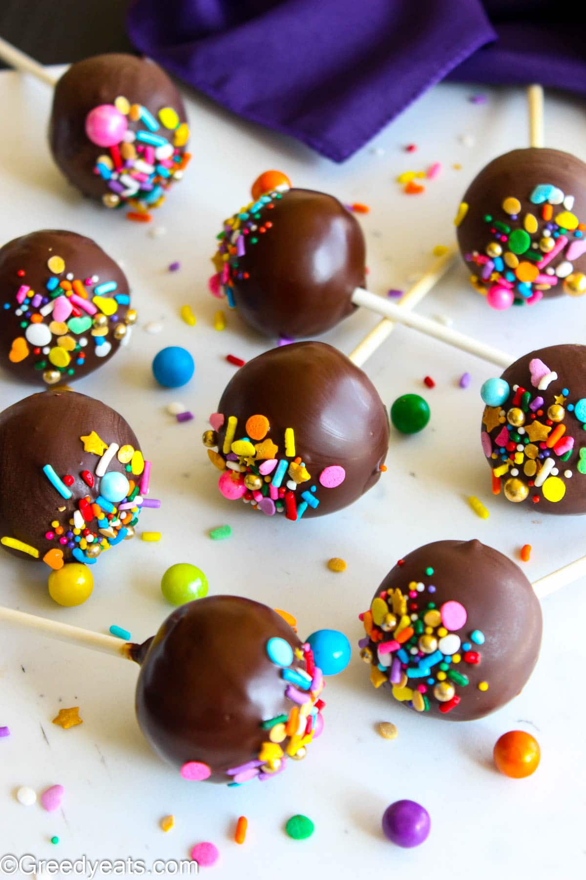 Home made cake pops made with cake mix, topped with candy melts and sprinkles.