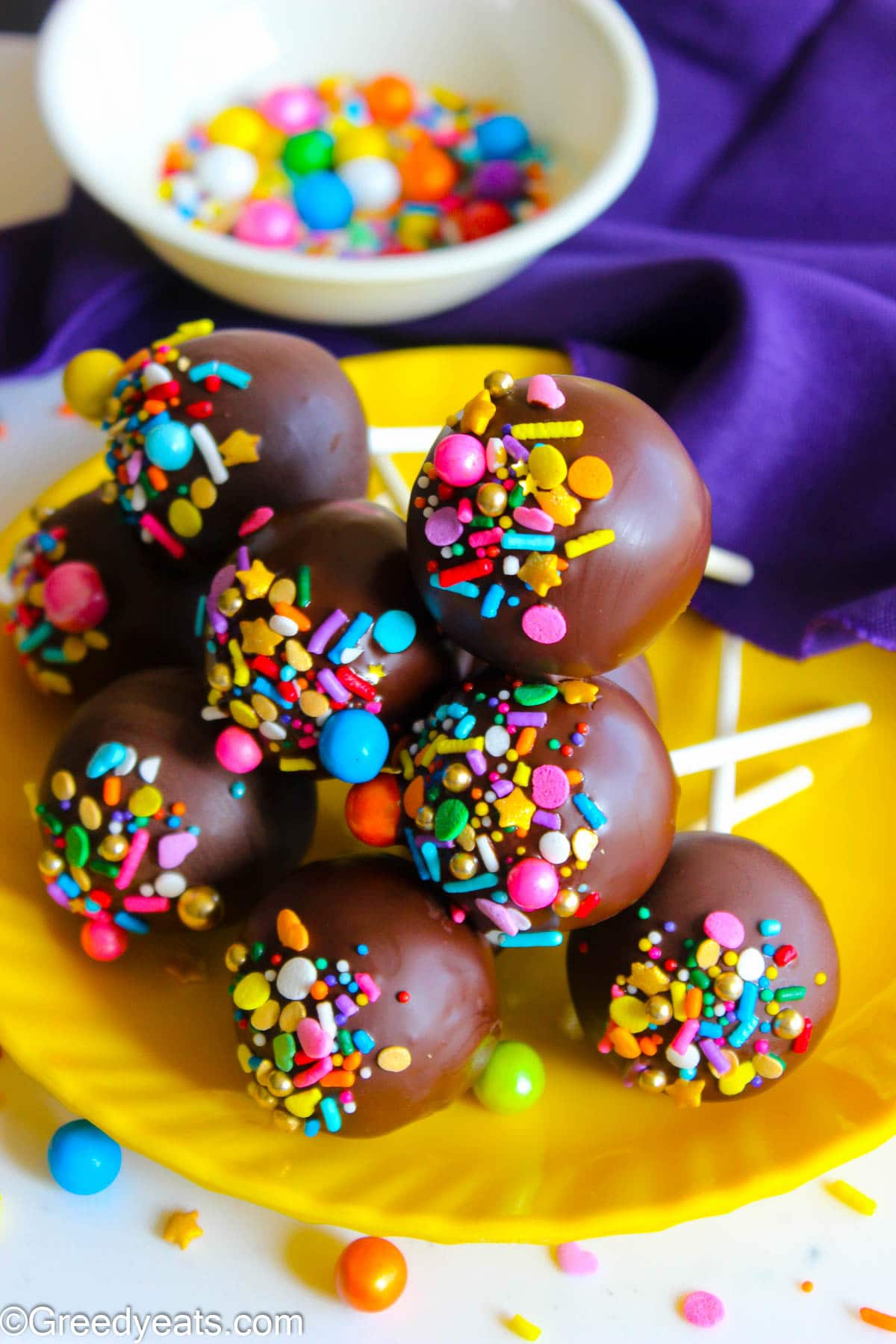 Easy Cake pops made with chocolate cake mix and chocolate frosting are coated in candy melts.