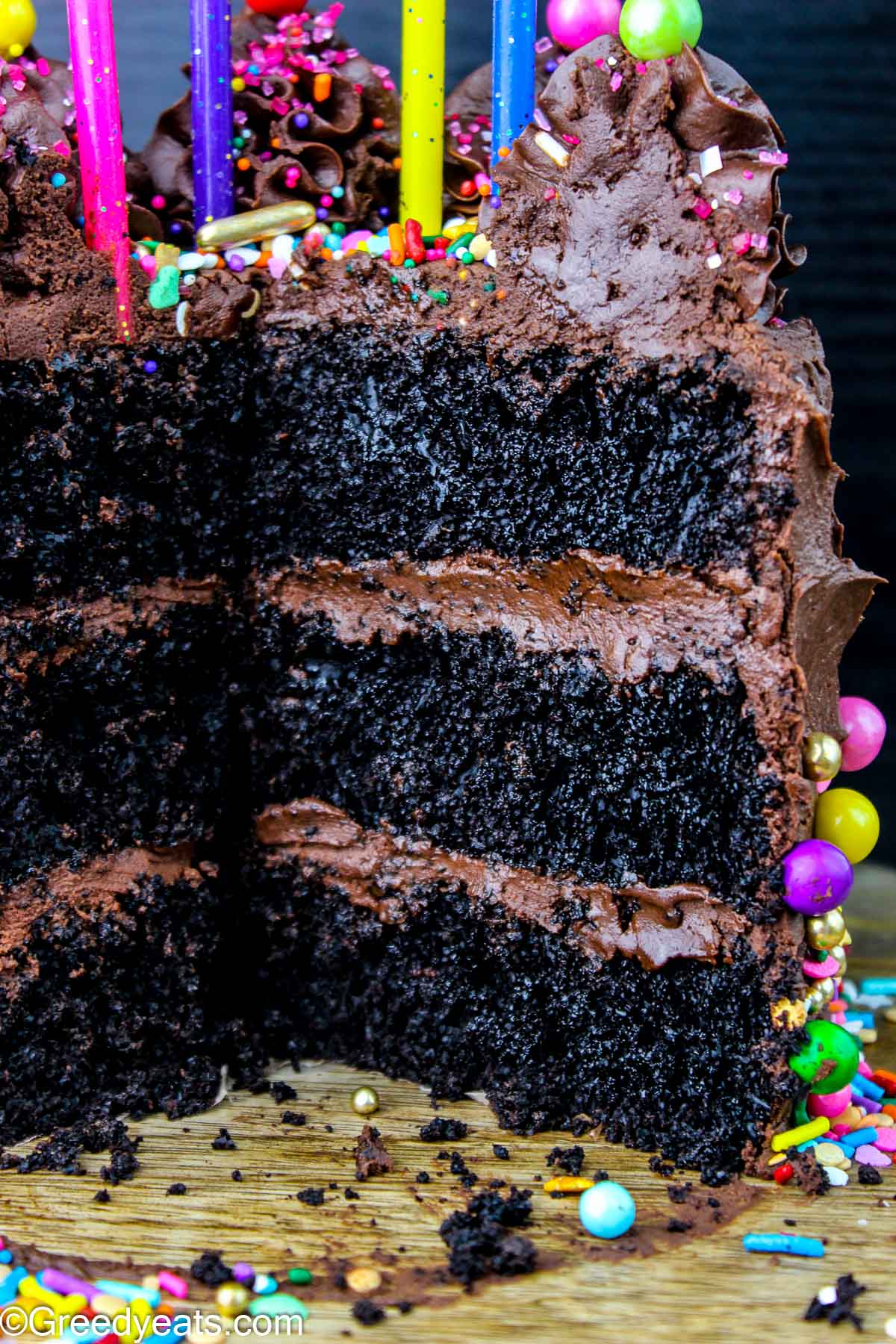 Super moist, rich and a light crumb chocolate cake recipe frosted with an easy chocolate Buttercream.