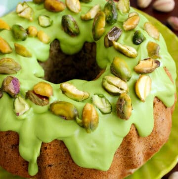 Pistachio Bundt Cake that bakes soft, moist and buttery, topped with Chocolate topping.