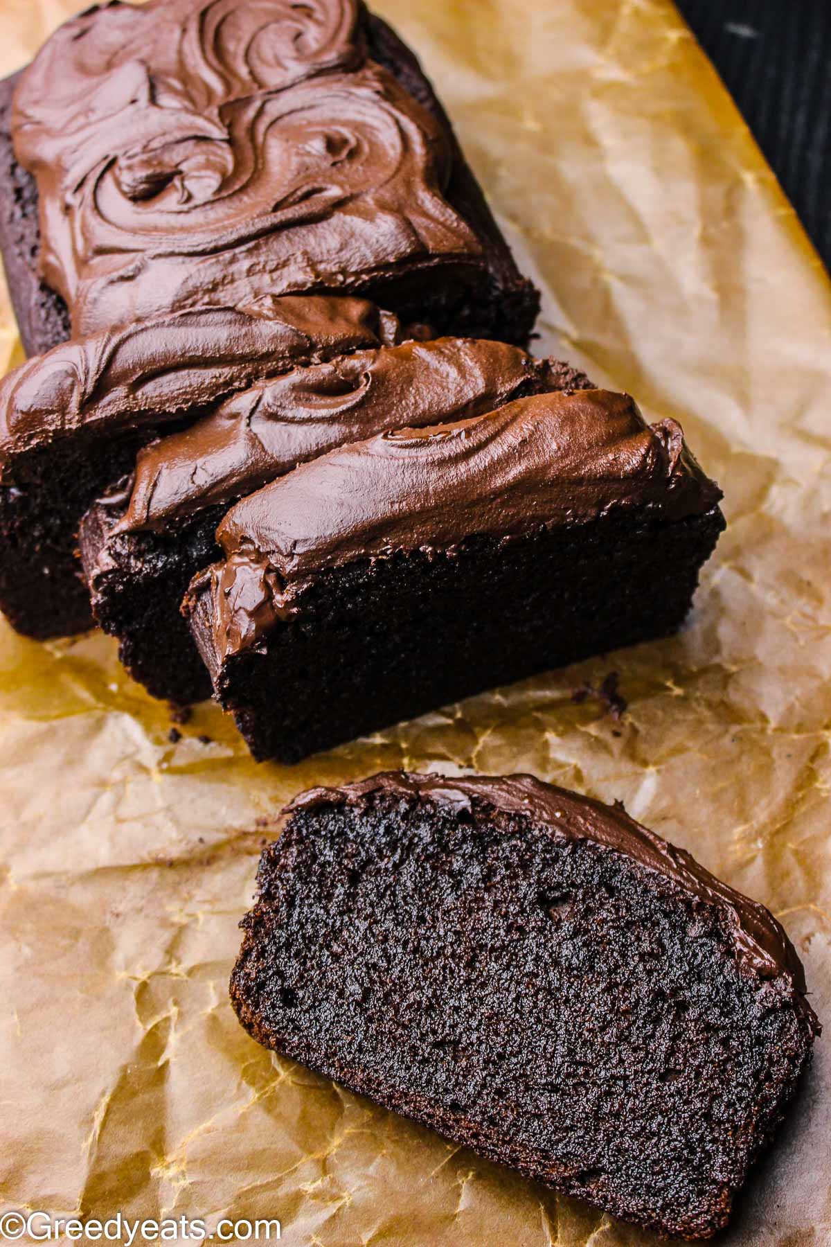 Smooth and sliky one minute chocolate frosting sitting over rich Chocolate Banana bread.