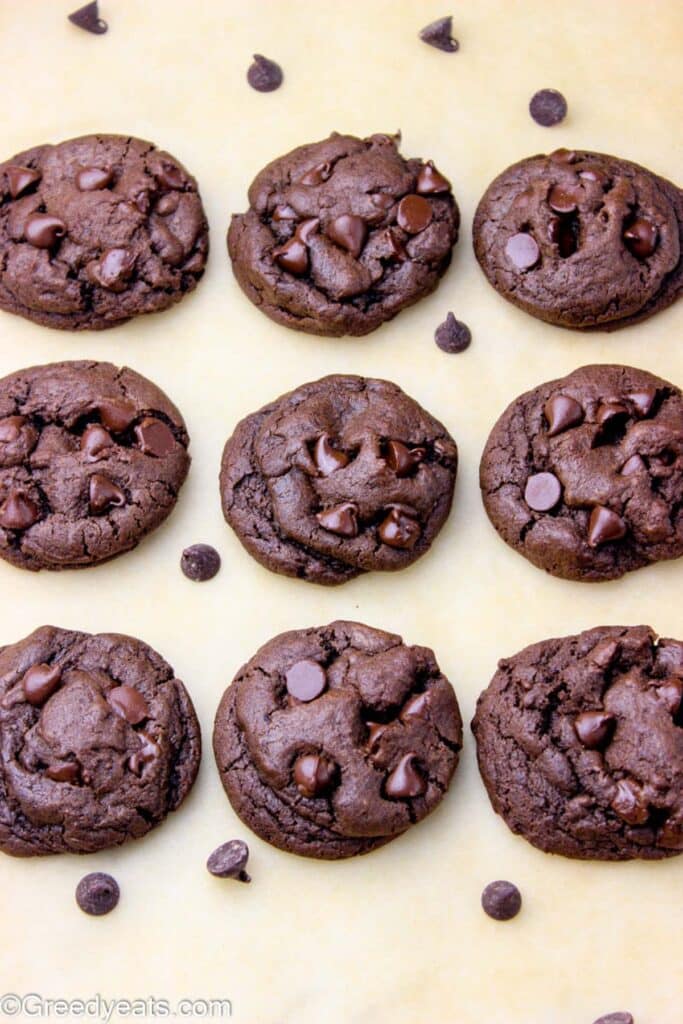 Gooey Double chocolate Chip cookies cooling on baking tray.