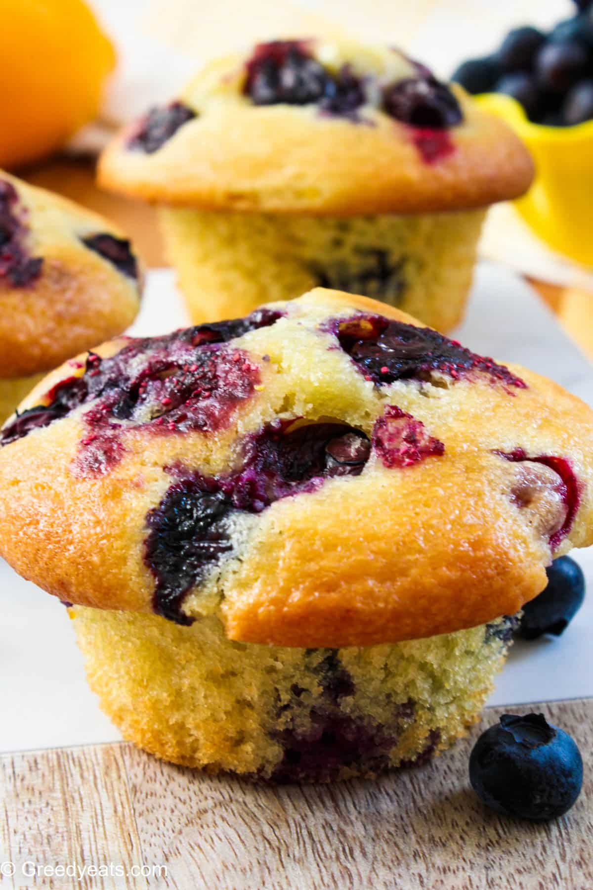 Tall and Soft Blueberry Lemon Muffin Recipe with softest crumb, filled with warm and juicy berries.