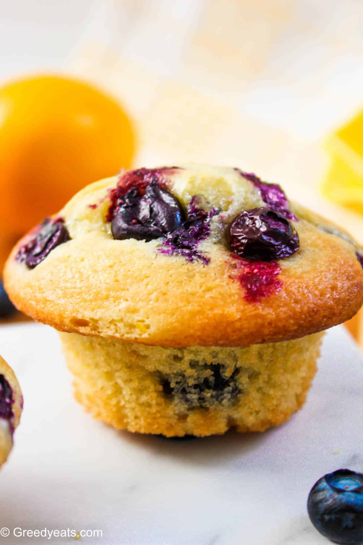 Soft, light and fluffy Lemon Blueberry Muffins made with yogurt and dotted with fresh blueberries.