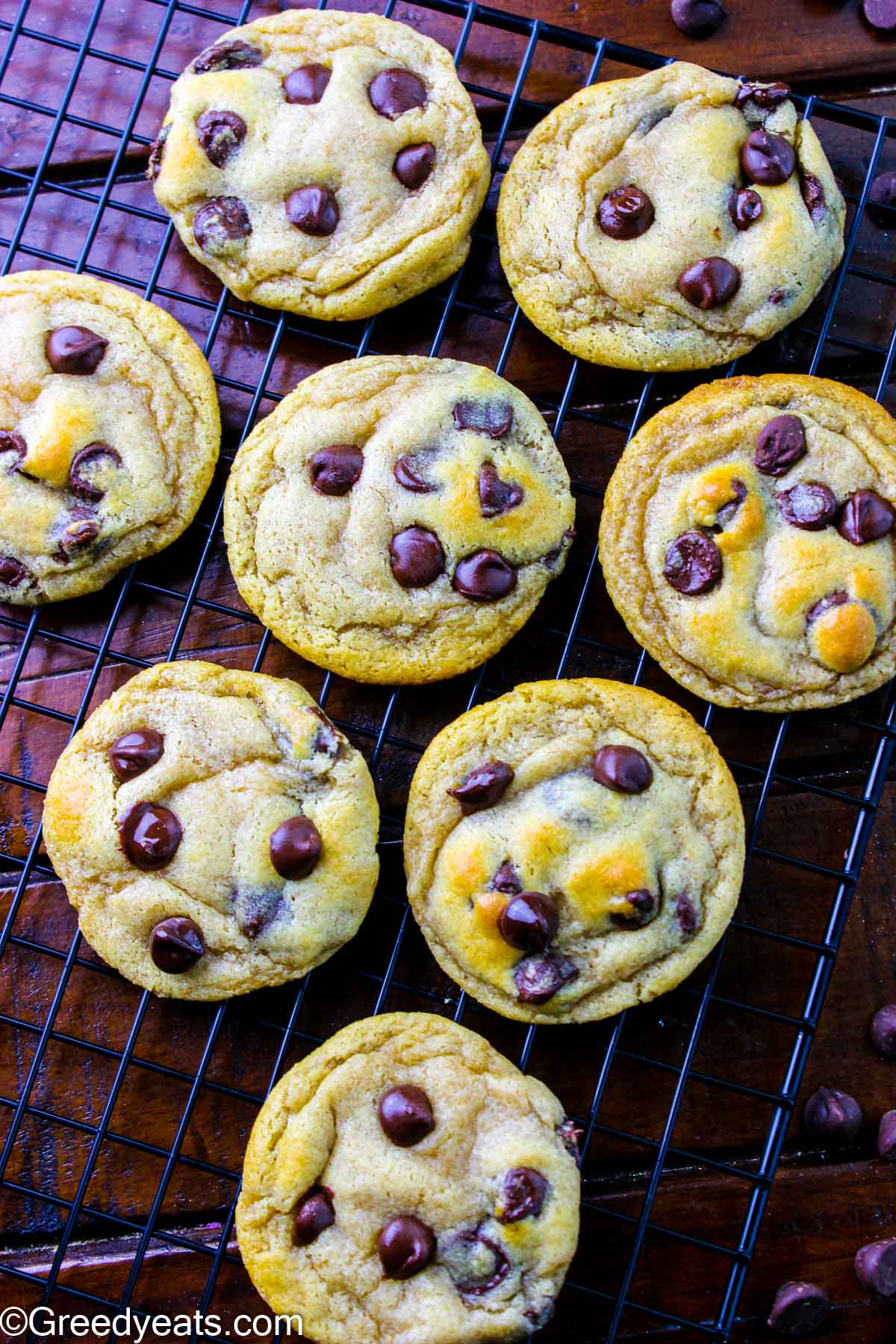 Brown butter cookies that are thick in centers, chewy on the edges, loaded with chocolate chips and cooling on a wire rack..