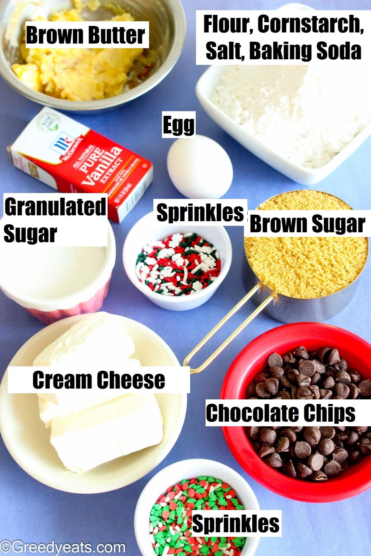 Ingredients spread like sugars, flour, baking soda, egg, chocolate chips, cornstarch and cream cheese for choc chip cookies.