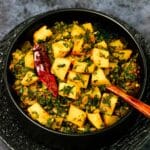 Spinach recipe made with potatoes and spinach - Aloo Palak recipe with garlic and onion.