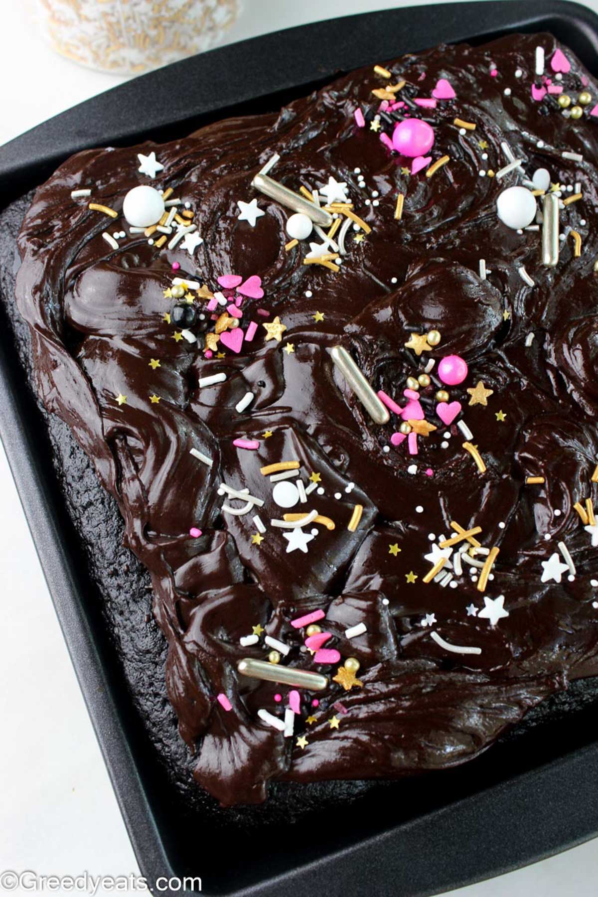 Moist Chocolate Cake made as one layer snack cake, frosted with easy chocolate ganache.