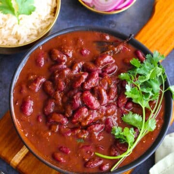 Kidney Beans Recipe made with dry red kidney beans, aromatics and spices, served in a large bowl.