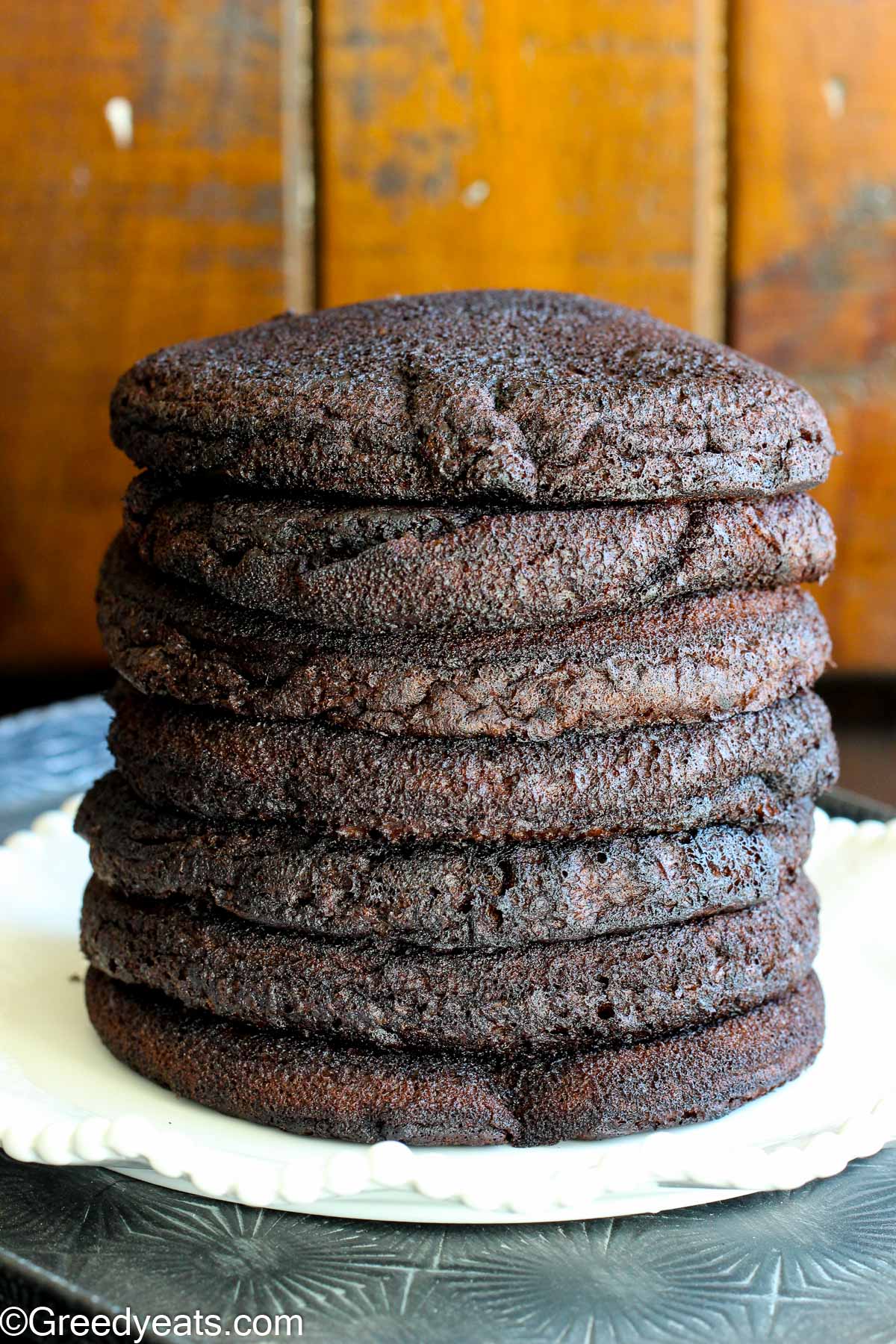 A stack of homemade chocolate pancakes. 