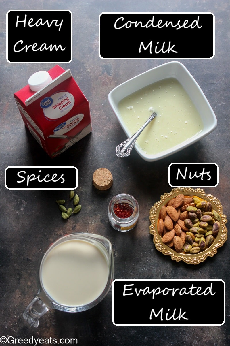 Ingredients like evaporated milk, heavy cream, condensed milk and spices to make kulfi.