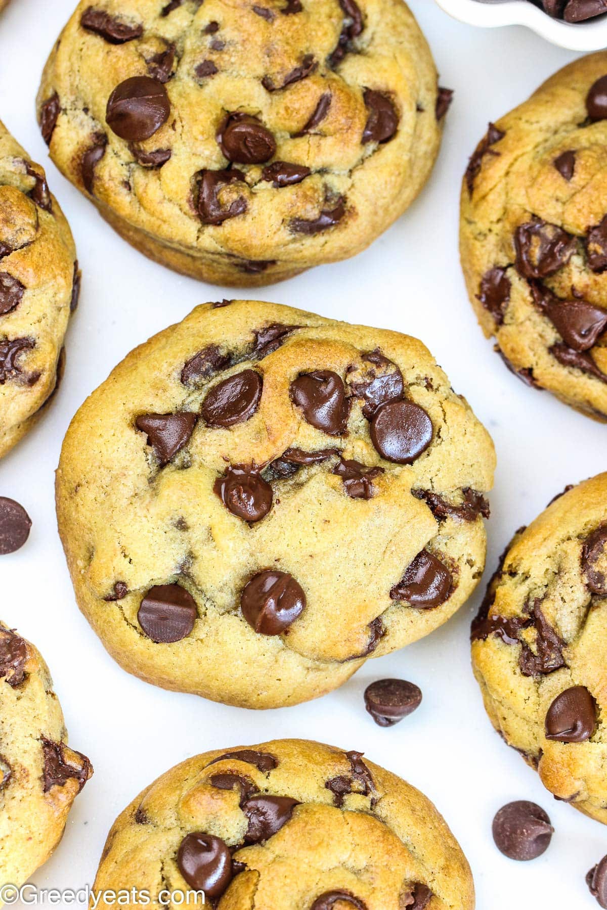 Thick, fluffy Cookies made with chocolate chips featuring ooey-gooey centers and golden edges. 