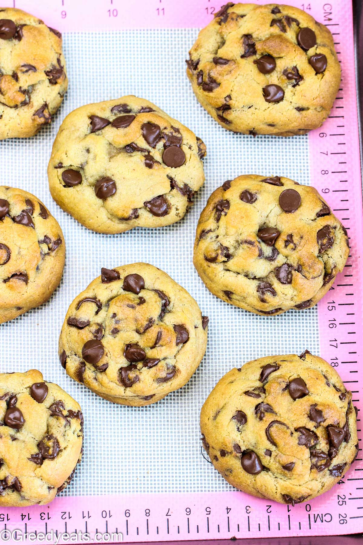 Perfect Chocolate Chip Cookies made with a combination of cake flour and all purpose flour on a silicone mat.