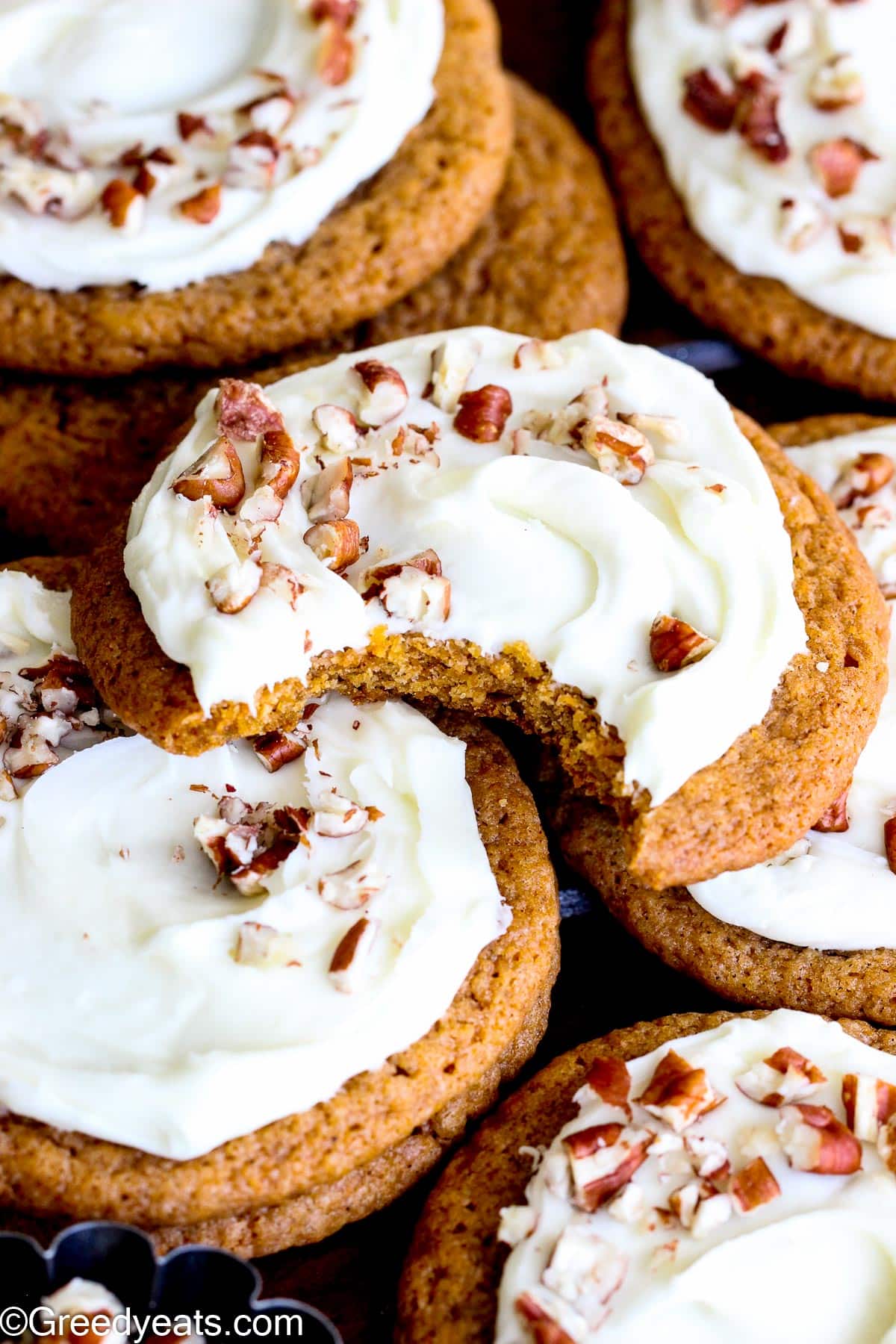 Easy Carrot Cookies that bake chewy, oh-so-soft and are topped with cream cheese frosting.