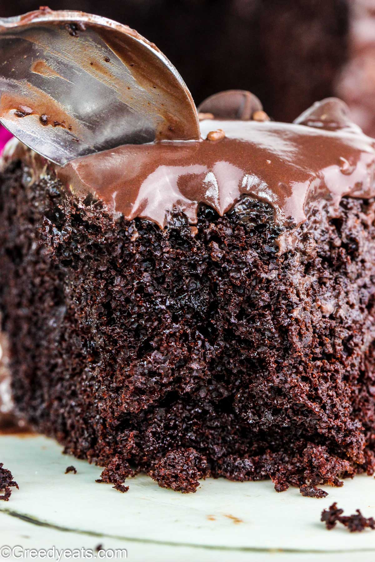 Easy Chocolate Ganache Cake made with simple ingredients and topped with chocolate ganache.