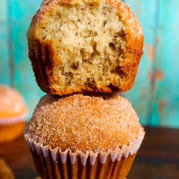 A stack of soft, fluffy Banana Muffins 2 Bananas with cinnamon sugar topping.
