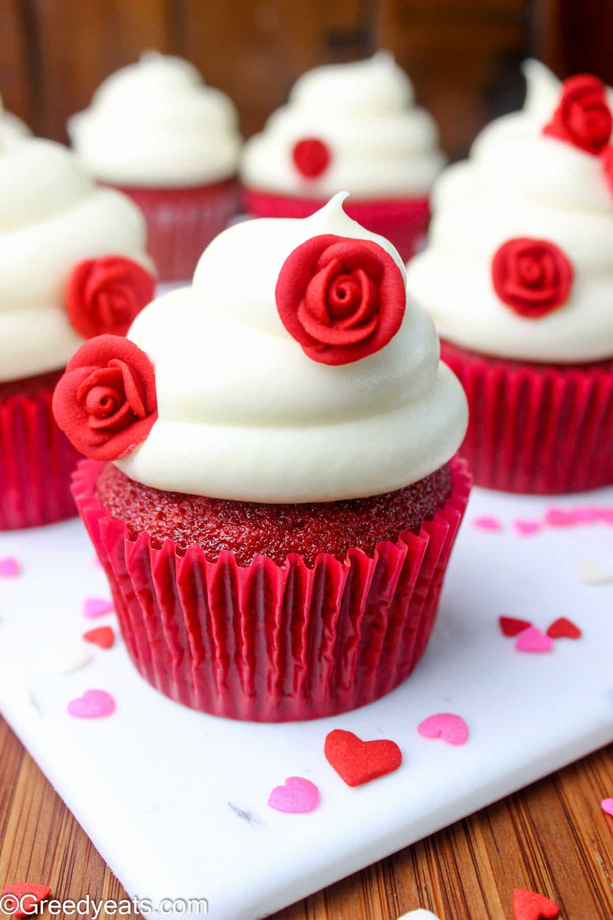 Moist and soft Red Velvet Cupcakes that are topped with sweet cream cheese frosting.