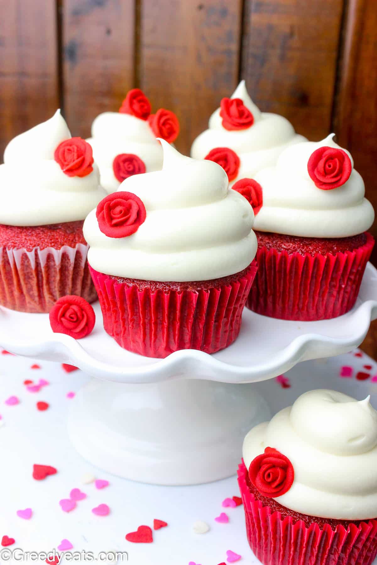 Red Velvet cupcakes topped with sturdy cream cheese frosting and sugar roses.