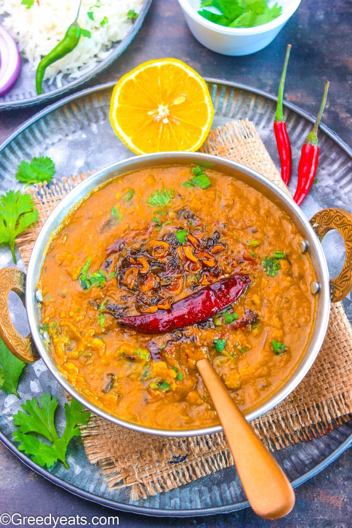 Easy Dal Fry Recipe made with toor dal, a little moong dal, aromatics and spices served with lemon and coriander.