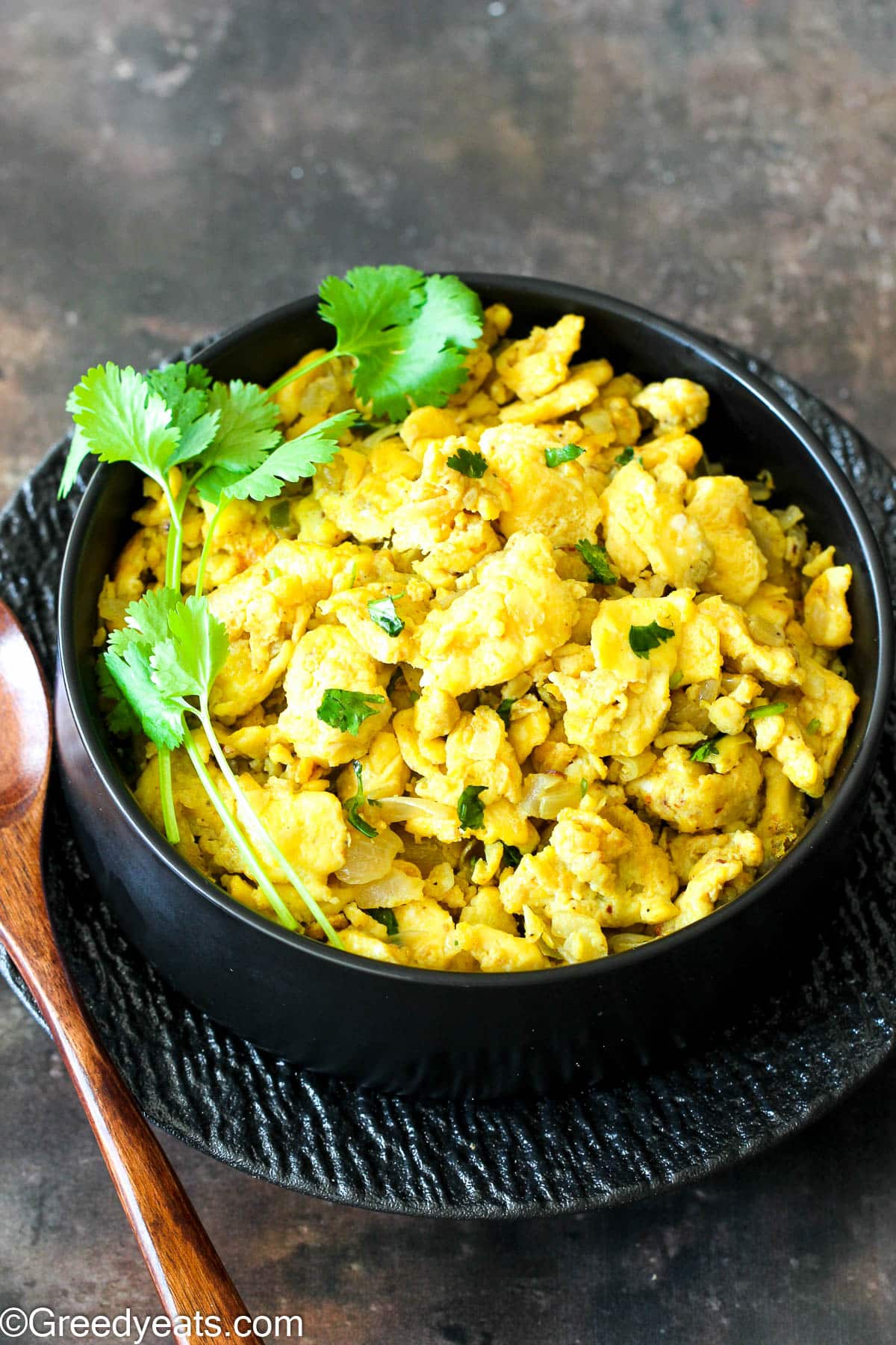Easy Egg Bhurji recipe made with onions, green chilies and indian spices and green coriander.