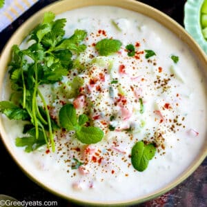 Easy raita recipe made with simple ingredients and served as a side to biryani.