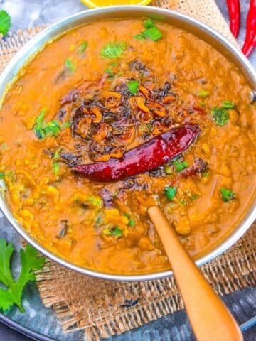 Homestyle Dal Fry served with a tempering of garlic, red dry chili and kasuri methi.