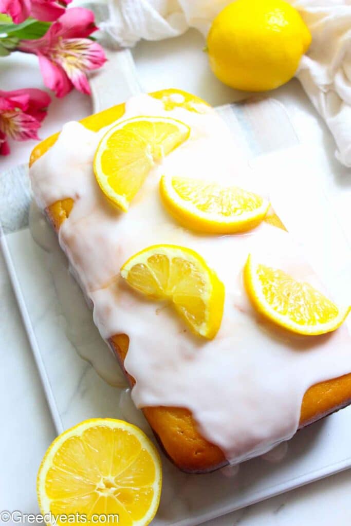 Lemon loaf soaked in lemon syrup and glazed with lemon icing.