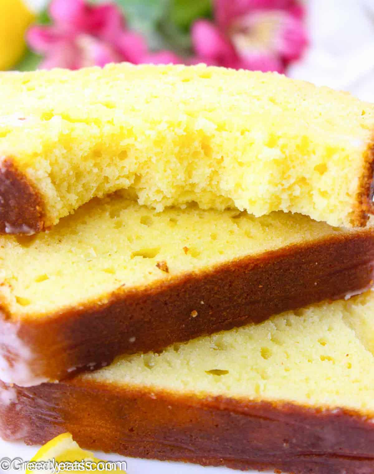 Soft and fluffy Lemon Olive Oli Cake baked with olive oil and greek yogurt.
