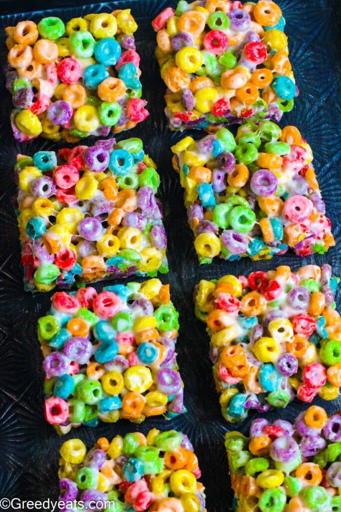 Fruit Loop Bars made with froot loops cereal, marshmallows and melted butter.