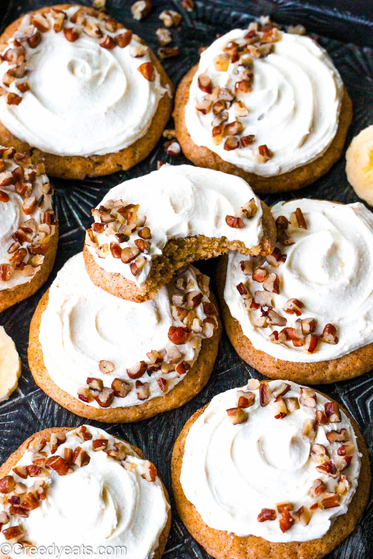 Chewy, soft and flavorful Banana Cookies topped with cream cheese frosting.