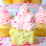 Soft, fluffy and moist Vanilla Cupcakes Recipe topped with a silky vanilla buttercream and sprinkles.
